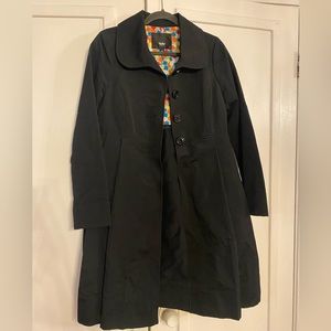 trench coat with a-line peplum type bottom